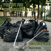 Black trash bags and cleaning tools on a paved path with text about environmental cleanup and recycled material.