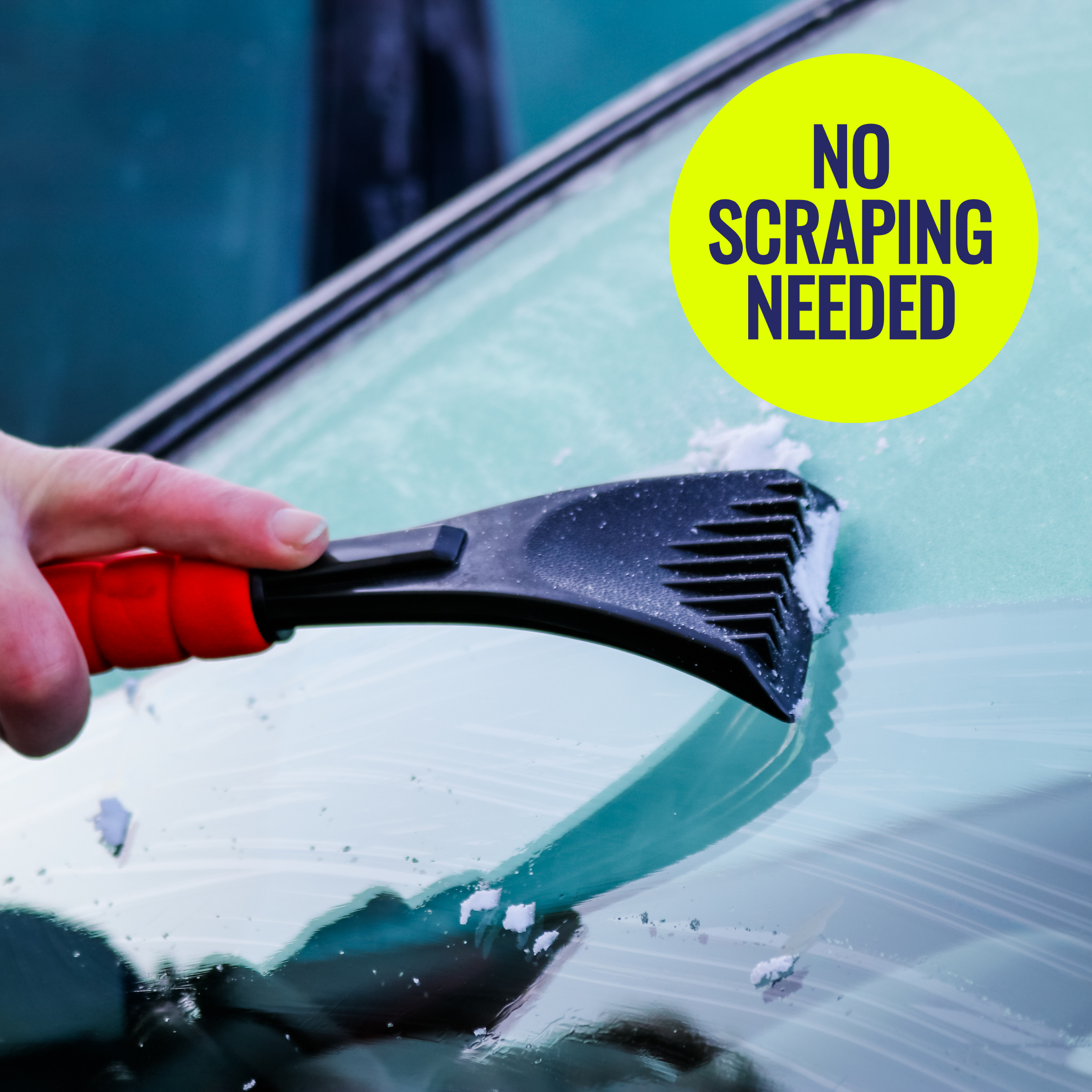 Person using a snow brush to clear ice from a car window with a 'No Scraping Needed' label.