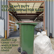 Green wheelie bin with a clear compactor sack in a warehouse setting